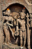 Orissa - Bhubaneshwar. Mukteswara temple, panels of  Shiva and Parvati  at the temple entrance. 