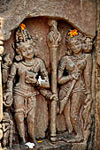 Orissa - Bhubaneshwar. Mukteswara temple, panels of  Shiva and Parvati  at the temple entrance. 