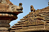 Orissa - Bhubaneshwar. Mukteswara temple, the torana with on the background a 'fling lion' overlooking the pediment on the jagmohana.