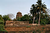 Orissa - Bhubaneswar. Papanashini Kund with the Lingaraj temple in the background. 