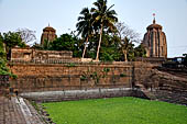 Orissa - Bhubaneswar. Papanashini Kund with the Lingaraj temple in the background. 