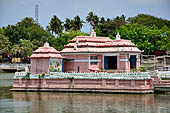 Orissa - Puri, the holy tank called Narendra Sagar with a small temple in the middle. 