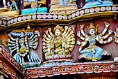 Orissa - Puri, colourful sculptures of Saptamatrikas and of the Dasamahavidya, the ten forms of the goddess,  on the facade of a temple found along the road leading to the beach. 