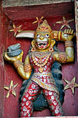 Orissa - Puri, colourful sculptures on the facade of a temple found along the road leading to the beach. 