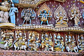 Orissa - Puri, colourful sculptures of Saptamatrikas and of the Dasamahavidya, the ten forms of the goddess,  on the facade of a temple found along the road leading to the beach. 