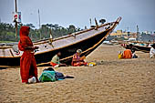 Orissa - Puri, the beach around sunset fills up with tourists and families. 