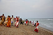 Orissa - Puri, the beach around sunset fills up with tourists and families. 