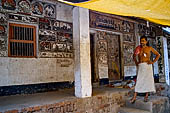 Orissa - Raghurajpur. Paintings decorating the house walls. 