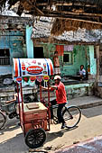 Orissa - Raghurajpur. Street seller.