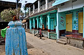 Orissa - Raghurajpur. Houses are lined at the sides of the village only road. 