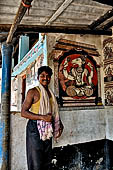 Orissa - Raghurajpur. Paintings decorating the house walls. 