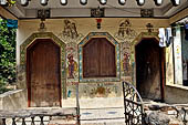 Orissa - Raghurajpur. Paintings decorating the house walls. 