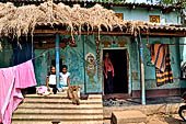 Orissa - Raghurajpur. Paintings decorating the house walls. 