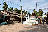 Orissa - Raghurajpur. Houses are lined at the sides of the village only road. 