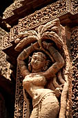 Orissa - Bhubaneswar. Rajarani temple, sculpture of alasa kanya (indolent maiden) in languid and alluring poses.