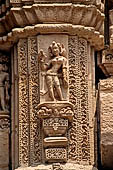 Orissa - Bhubaneswar. Rajarani temple, sculpture of alasa kanya (indolent maiden) in languid and alluring poses.