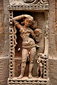 Orissa - Bhubaneswar. Rajarani temple, sculpture of 'alasa kanya' (indolent maiden) in languid and alluring poses.