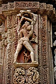 Orissa - Bhubaneswar. Rajarani temple, sculpture of 'alasa kanya' (indolent maiden) in languid and alluring poses.