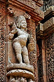 Orissa - Bhubaneswar. Rajarani temple, Kubera (dikpala of the north), God of Prosperity on top of seven jars of gems. 