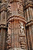 Orissa - Bhubaneswar. Rajarani temple, sculputres of the deul with Kubera the dikpala of the north. 