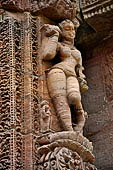 Orissa - Bhubaneswar. Rajarani temple, sculpture of 'alasa kanya' (indolent maiden) in languid and alluring poses. 