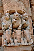 Orissa - Bhubaneswar. Rajarani temple, lions at the base of the pillars of the gates of the jagamohana. 