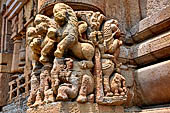 Orissa - Bhubaneswar. Rajarani temple, lions at the base of the pillars of the gates of the jagamohana.