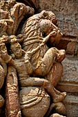 Orissa - Bhubaneswar. Rajarani temple, frieze of a 'virala' dragon represented rampant with a knight raiding the monster.