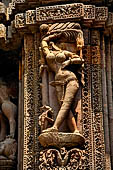 Orissa - Bhubaneswar. Rajarani temple, sculpture of alasa kanya (indolent maiden) in languid and alluring poses.