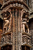 Orissa - Bhubaneswar. Rajarani temple, sculpture of alasa kanya (indolent maiden) in languid and alluring poses.