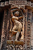 Orissa - Bhubaneswar. Rajarani temple, sculpture of 'alasa kanya' (indolent maiden) in languid and alluring poses.