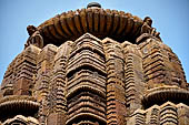 Orissa - Bhubaneswar. Rajarani temple, 'deul charinis' figures supporting the amalaka in the four cardinal directions. Particular form of lioness the charinis are related to the demi-gods floating through the air.