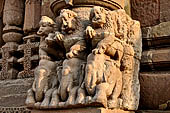 Orissa - Bhubaneswar. Rajarani temple, lions at the base of the pillars of the gates of the jagamohana.