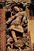 Orissa - Bhubaneswar. Rajarani temple, sculpture of 'alasa kanya' (indolent maiden) in languid and alluring poses.