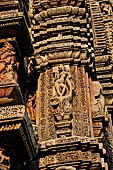 Orissa - Bhubaneswar. Rajarani temple, sculpture of 'alasa kanya' (indolent maiden) in languid and alluring poses. 