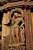 Orissa - Bhubaneswar. Rajarani temple, sculpture of 'alasa kanya' (indolent maiden) in languid and alluring poses. 