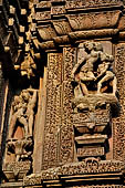 Orissa - Bhubaneswar. Rajarani temple, sculpture of 'alasa kanya' (indolent maiden) in languid and alluring poses.