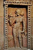 Orissa - Bhubaneswar. Rajarani temple, sculpture of 'alasa kanya' (indolent maiden) in languid and alluring poses.