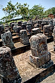 Ratnagiri - Portable monolithic stupas. A large number (more than 700) of small stupas are loose on the ground.