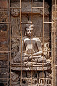 Ratnagiri - Main monastery courtyard. Bhudda in 'bhumisparsa-mudra' flanked by Avalokitesvara and Vajrapani.