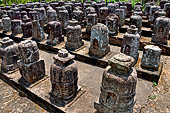 Ratnagiri - Portable monolithic stupas. A large number (more than 700) of small stupas are loose on the ground.