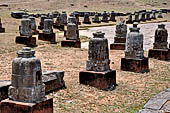 Ratnagiri - Portable monolithic stupas. A large number (more than 700) of small stupas are loose on the ground.