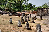 Ratnagiri - Portable monolithic stupas. A large number (more than 700) of small stupas are loose on the ground.