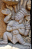 Ratnagiri - entrance porch of the main monastery - detail of Vajrapani panel, Hayagriva his fierceful attendant. 