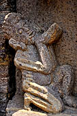 Ratnagiri - entrance porch of the main monastery - detail of Vajrapani panel, the 'preta'.. 