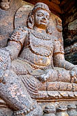 Ratnagiri - Kubera (Ca. 11th c. ce). The spirit-deity images of Kubera, the yaksa king, and his consort Hariti, are located at the entrance of Ratnagiris main monastery in their
 
familiar role as guardian. 