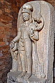 Ratnagiri - The sanctum of the main monastery: Avalokiteshvara Padmapani as attendant on Buddha (8th c.). 