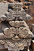 Ratnagiri - The main monastery. Stone sculptures of the courtyard. Decorative details. 