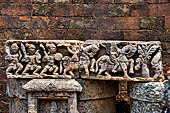 Ratnagiri - The main monastery. Stone sculptures of the courtyard. Decorative details. 