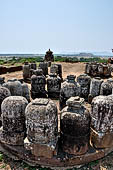 Ratnagiri - Portable monolithic stupas. A large number (more than 700) of small stupas are loose on the ground.